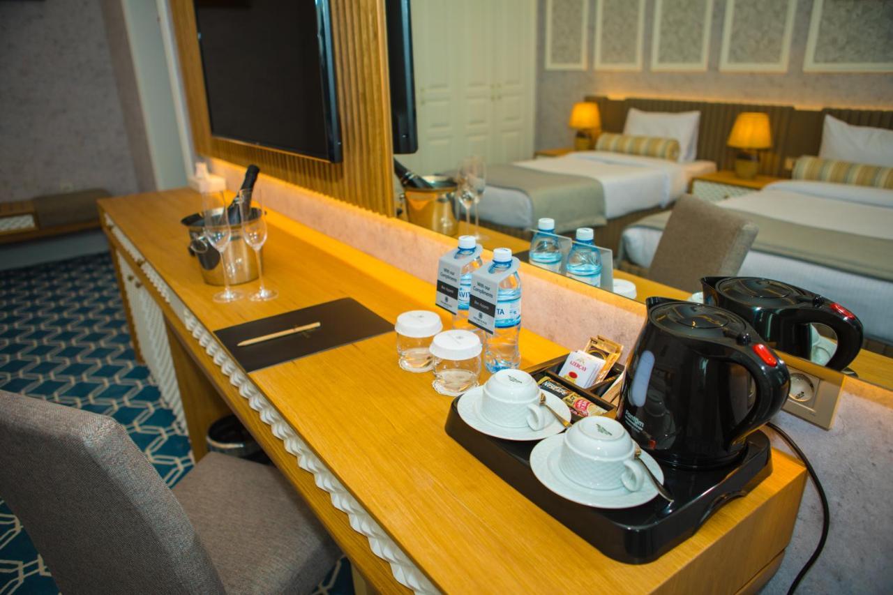 Promenade Hotel Baku Luaran gambar A hotel room with a Nespresso machine